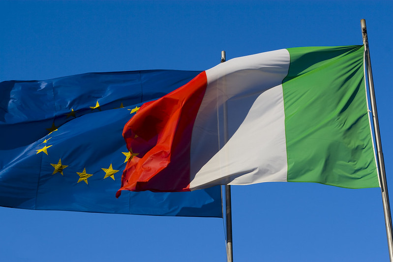 The Italian flag alongside the European Union flag, displayed during the Italy-Turkey bilateral meeting in Rome.
