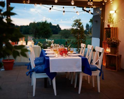 Table set, outdoors, ready for meal