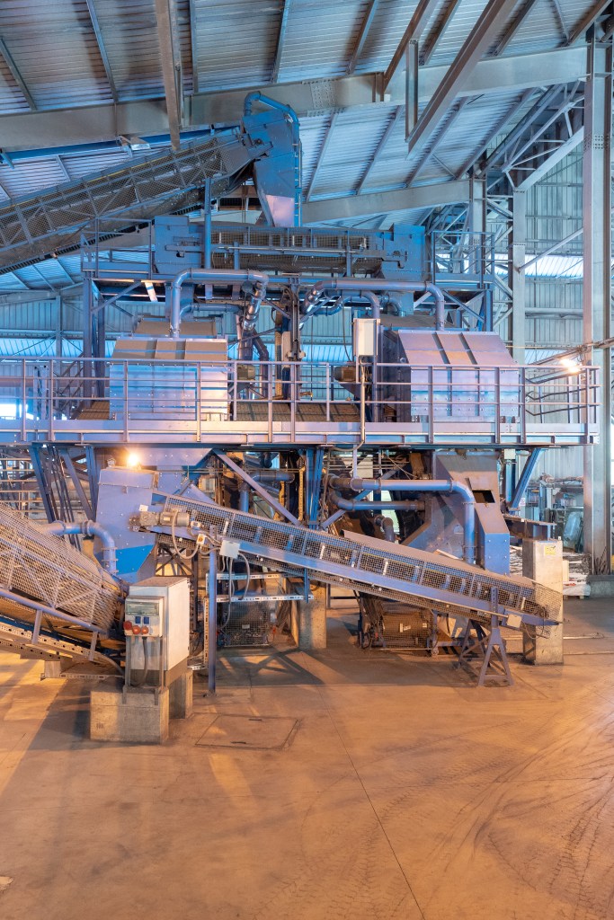 Industrial machinery for material handling in a steel plant, showcasing advanced engineering design and structure.
