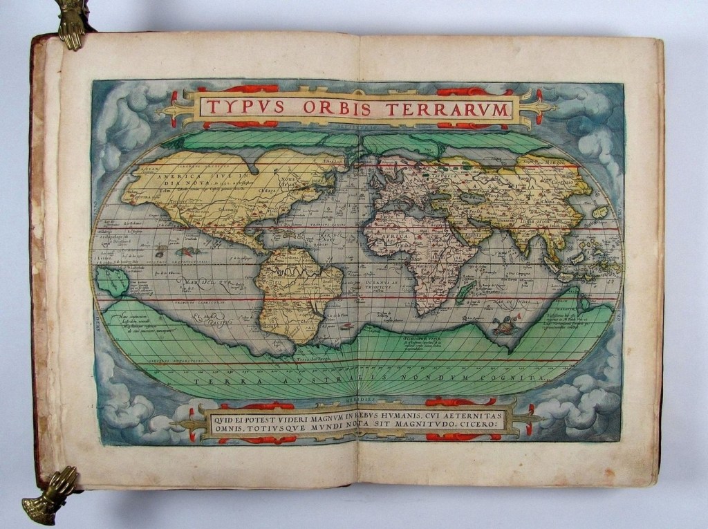A vintage map titled 'Typus Orbis Terrarum' depicting the world, featuring colorful illustrations of continents, oceans, and decorative elements, with text in Latin.